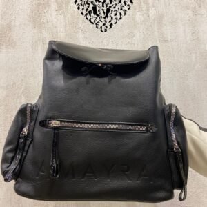 MOCHILA CON DETALLES EN CHAROL